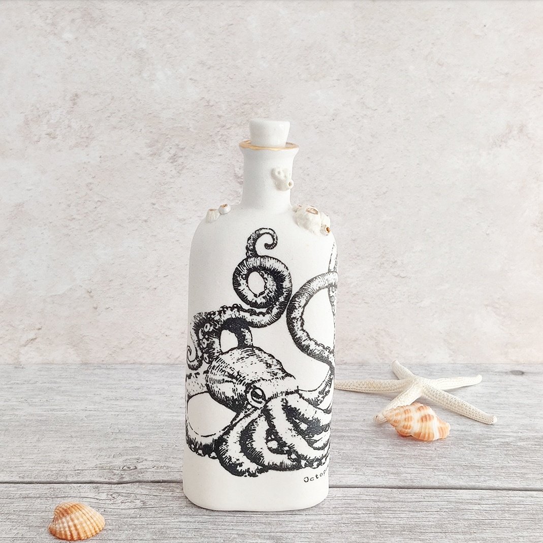 Porcelain 'boots' octopus bottle with barnacles