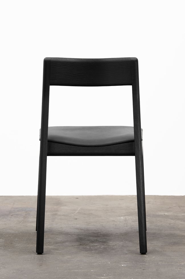 ROSE DINING CHAIR IN TORCHED TASMANIAN OAK WITH AN UPHOLSTERED LEATHER SEAT