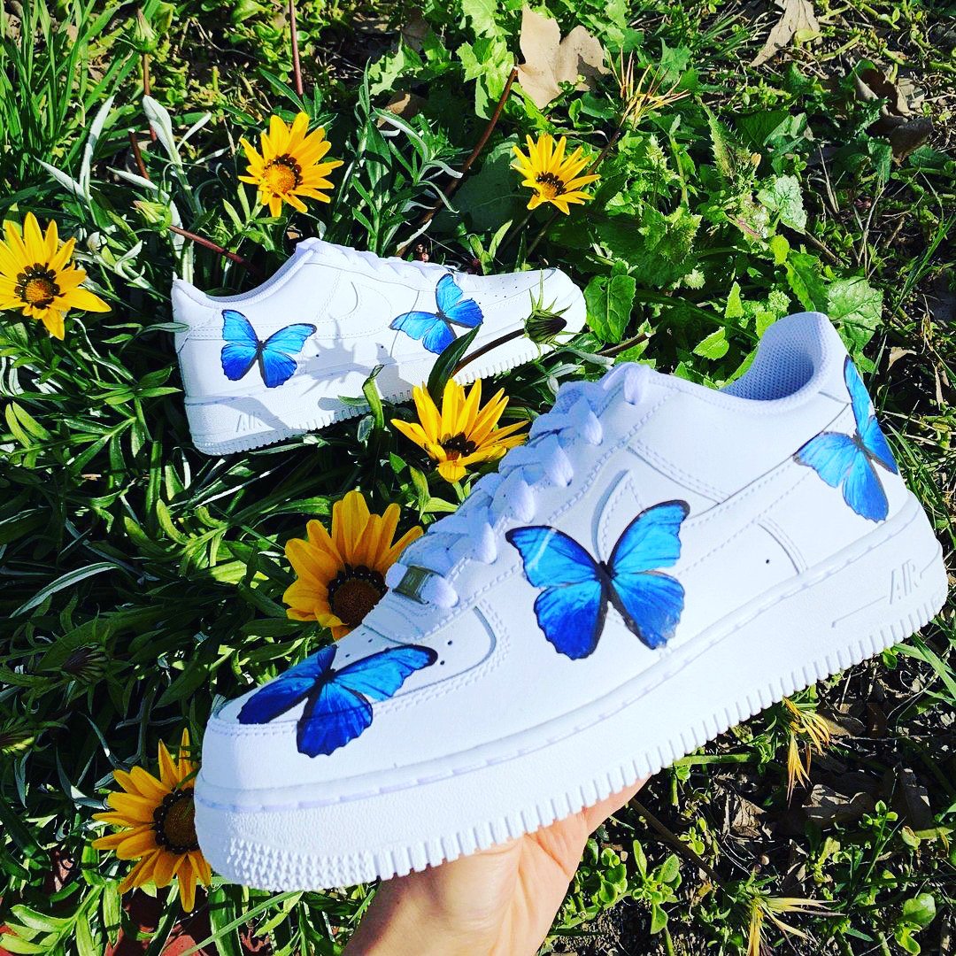 air force ones with blue butterflies on them