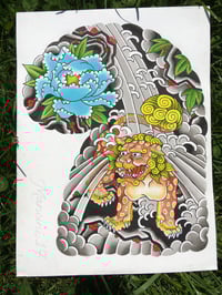 Foo dog under waterfall