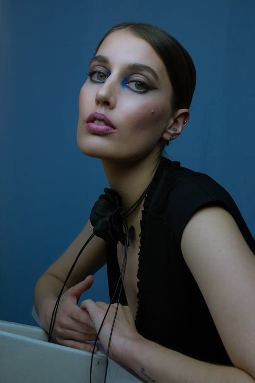 Image of Black leather flower necklace on strands