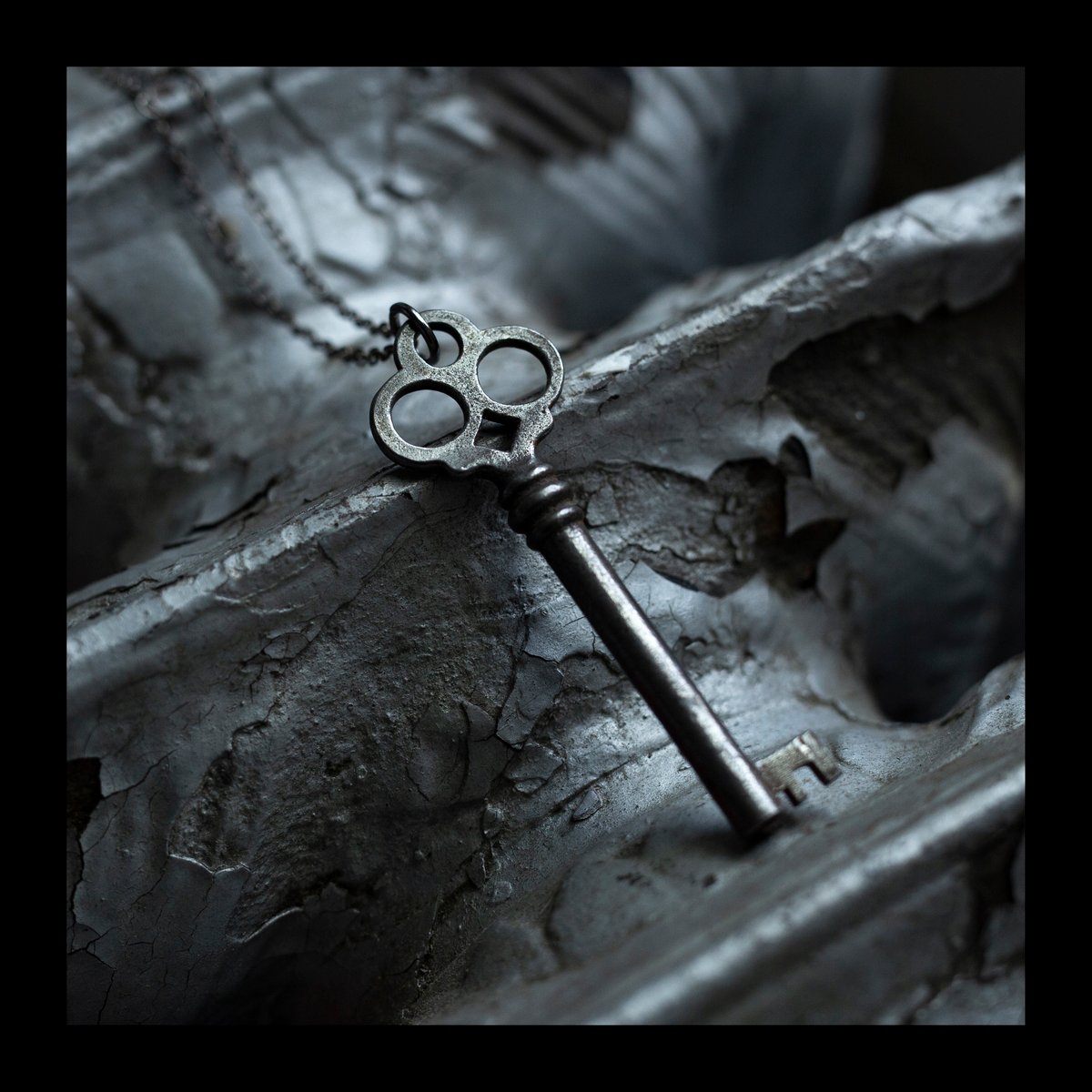 Ornate Silver Key on Gunmetal Chain | kristen llewellyn