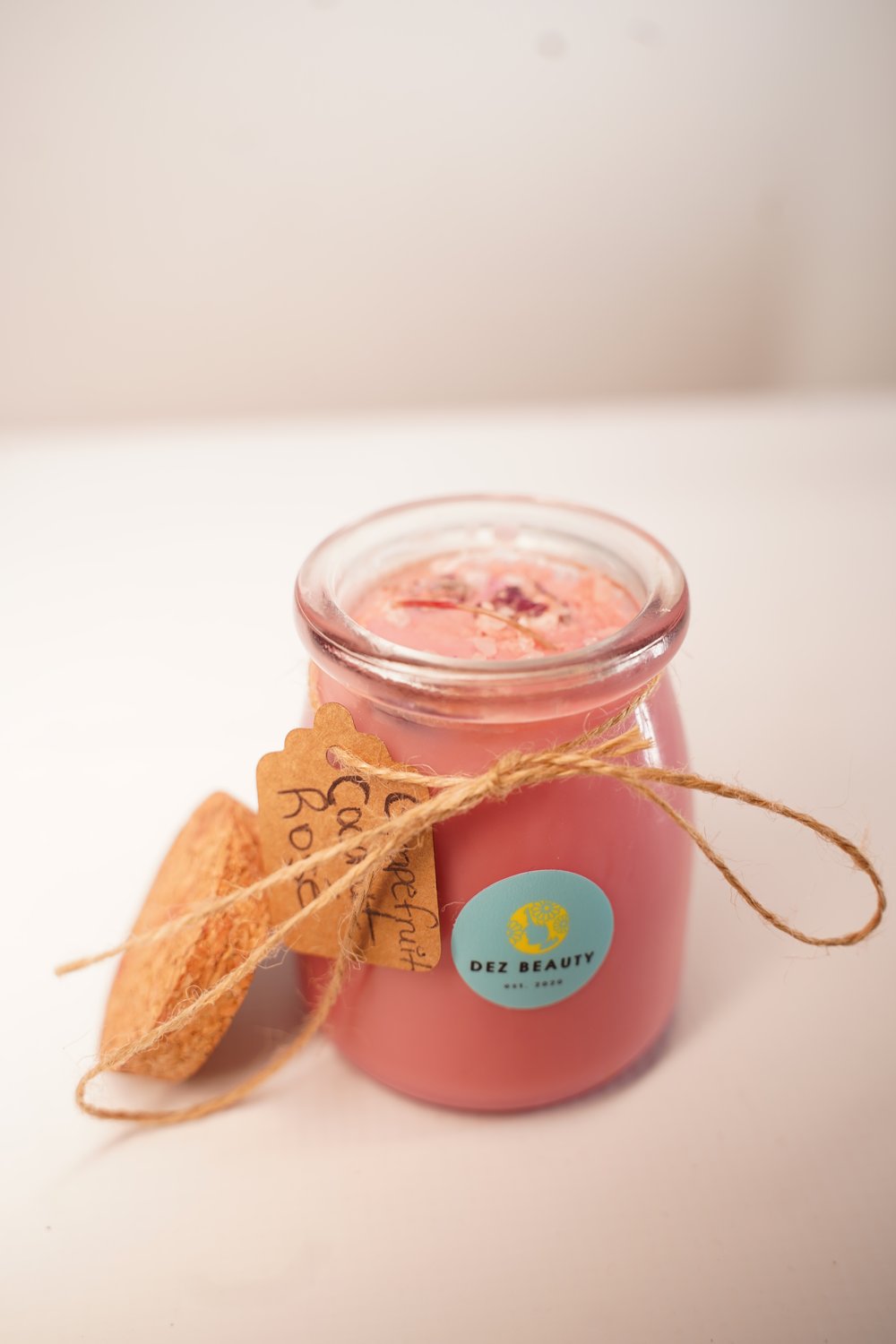 Image of GRAPEFRUIT COCONUT ROSÈ w/ Rose Quartz CANDLE