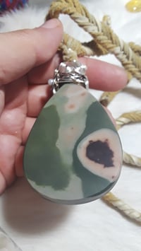 Image 2 of Soft Leather necklace with Beautiful Carved Mother of pearl on carved natural Jasper stone pendant 