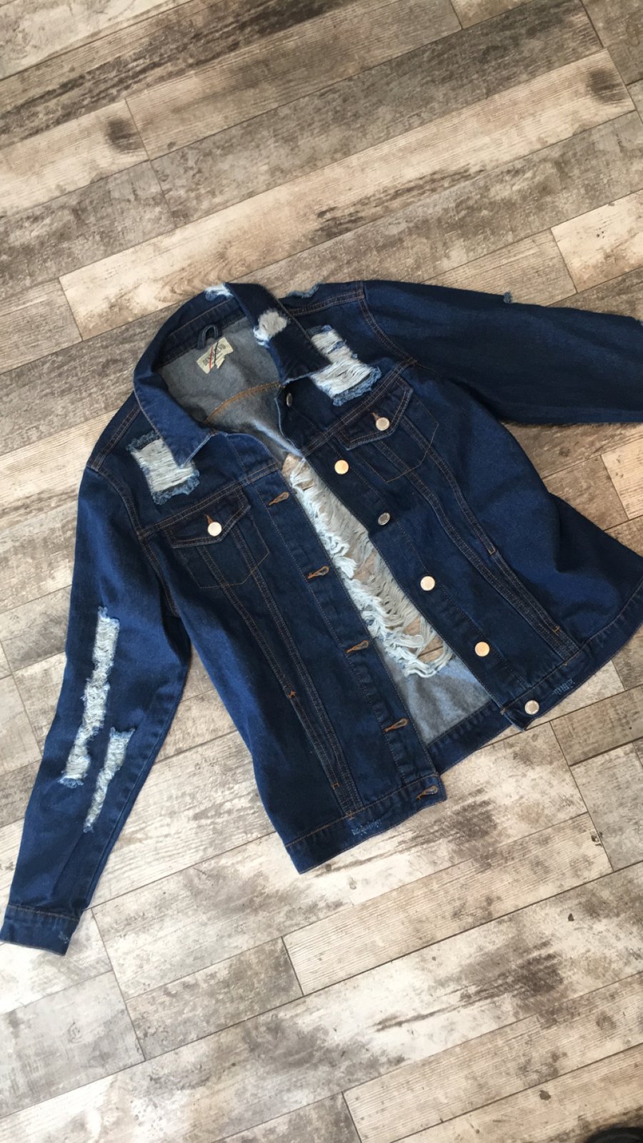 shredded jean jacket