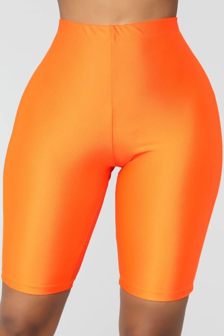 orange biker shorts