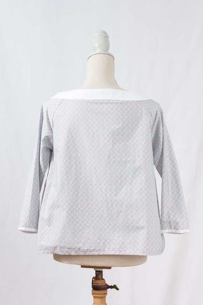 Chemisier  motifs bleus ciel et oranges