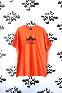 Image of set fire to the liars tee in orange 