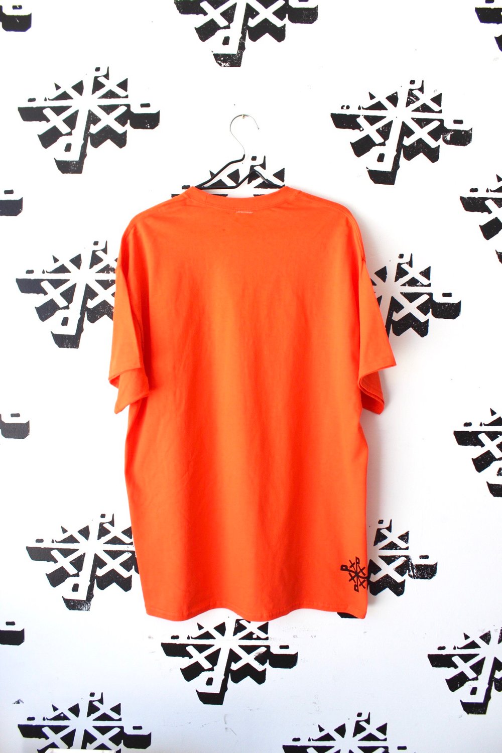 set fire to the liars tee in orange 