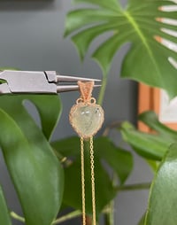 Image 1 of Gold Peridot Heart Crystal Necklace
