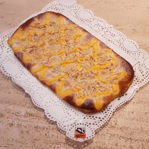 Image of COCA de SANT JOAN de BRIOIX (crema o fruita) FARCIDA de CABELL D'ÀNGEL