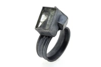 Image 1 of Sculptural silver ring set with mirror cut aquamarine with goethite inclusions. Chris Boland 