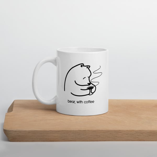 Image of bear, with coffee mug
