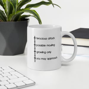 Image of bear, with coffee mug