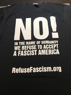 Image of In the Name of Humanity We Refuse to Accept a Fascist America