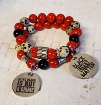 Image 1 of Red/Dalmatian Jasper Bracelet