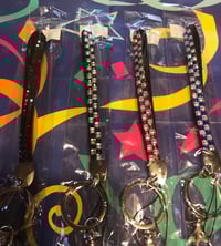 Image 1 of Dazzle medium keychains