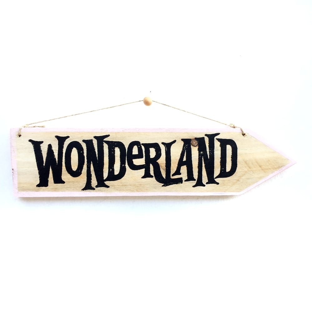 Image of Cartel flecha Wonderland