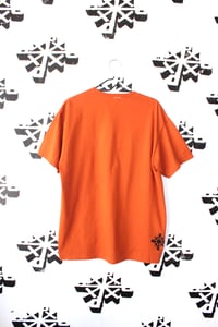 Image of pick out tee in burnt orange 