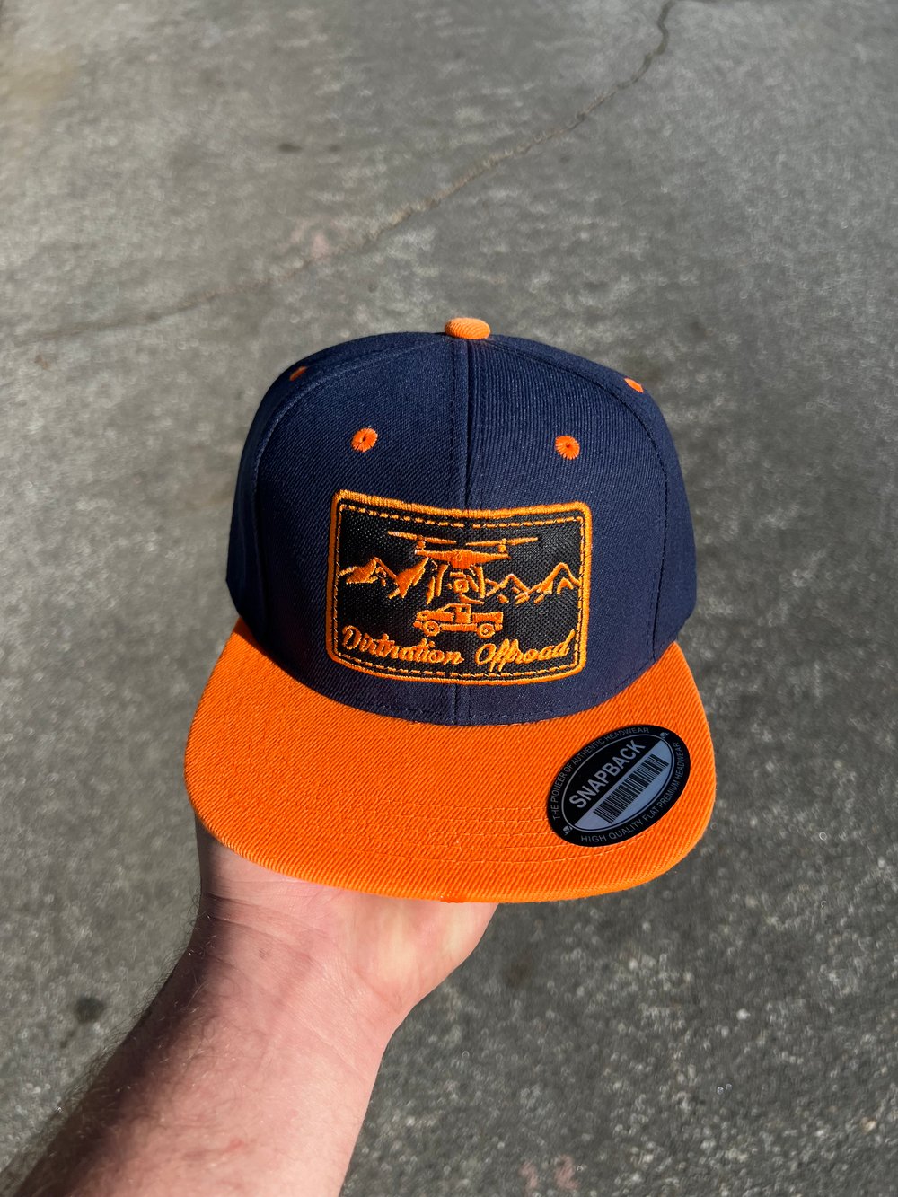 Hat-DN Logo Orange/Blue