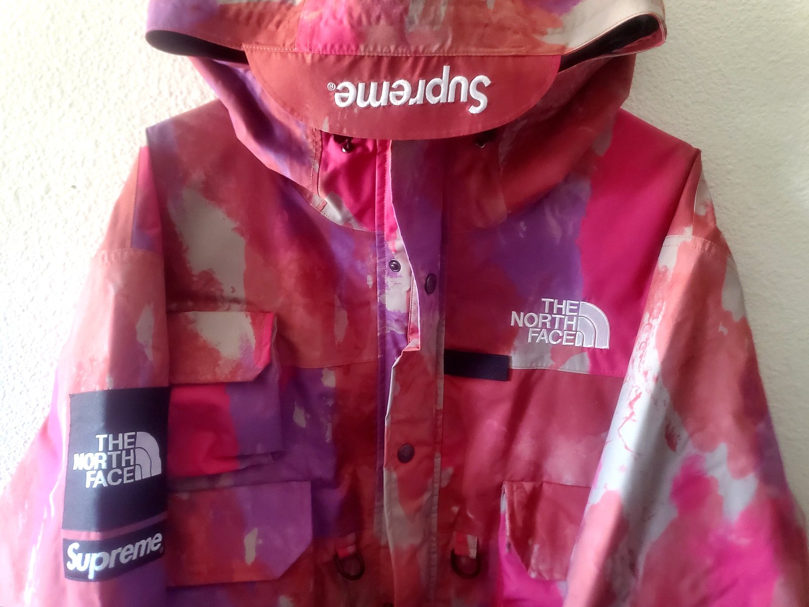 multi colored north face jacket