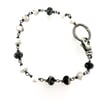 White Buffalo bracelet with twig circle closure