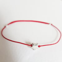 Image 1 of SOPHIE silver star on red