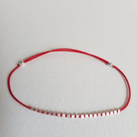 Image 1 of COLETTE silver on red