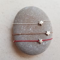 Image 4 of SOPHIE silver star on red