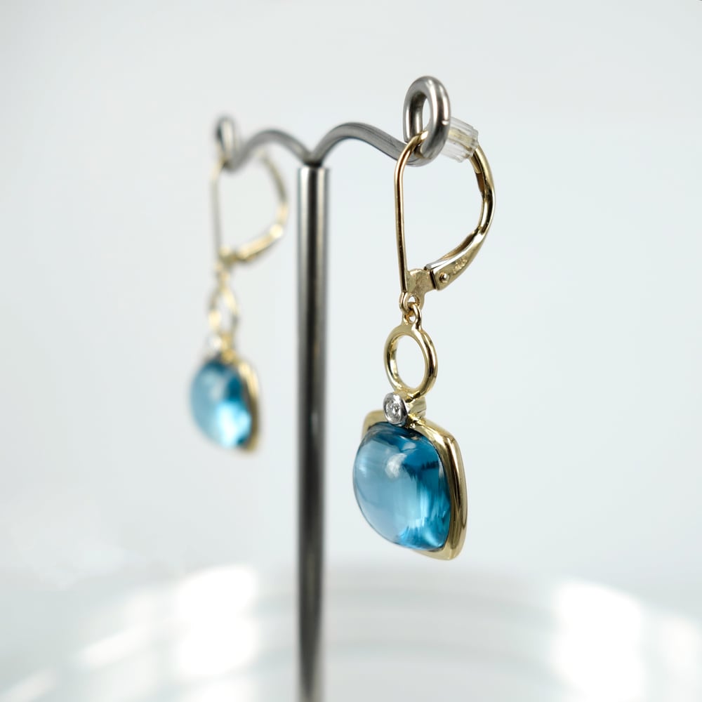 Image of M3139 - 9ct yellow gold diamond and Blue Topaz earrings 