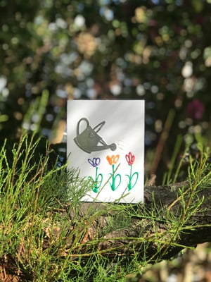 Image of Watering Flowers