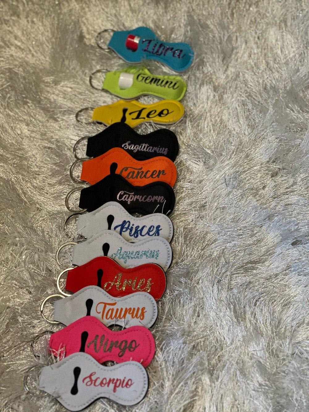 Image of Zodiac chapstick keychains