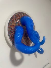 Image 3 of Triple blue tentacles on white wound base with sprinkles