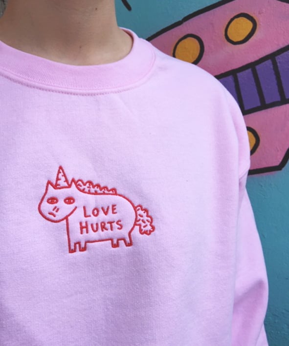 Image of Love Hurts Pink Sweatshirt