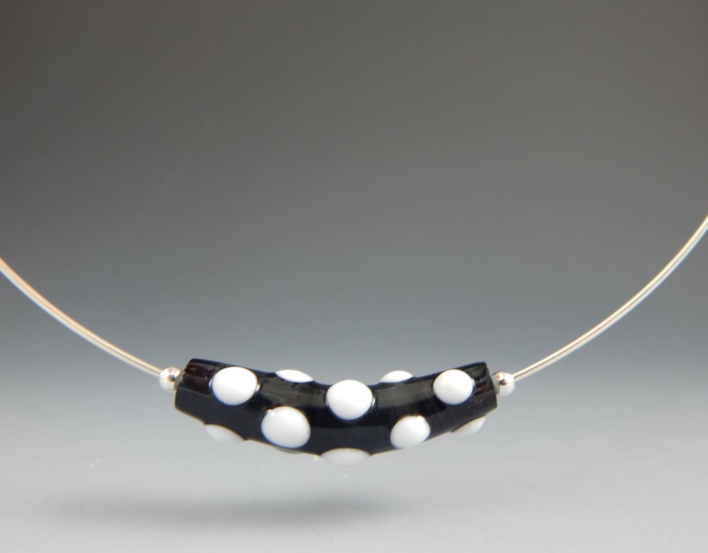 Image of Artisan Glass • Black Curved Bead with White Dots