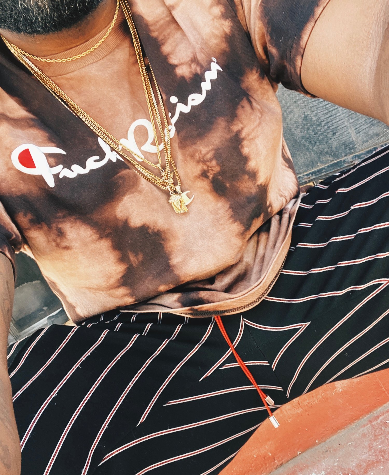 Image of Fuck Racism Unisex TShirts - Tie Dye 