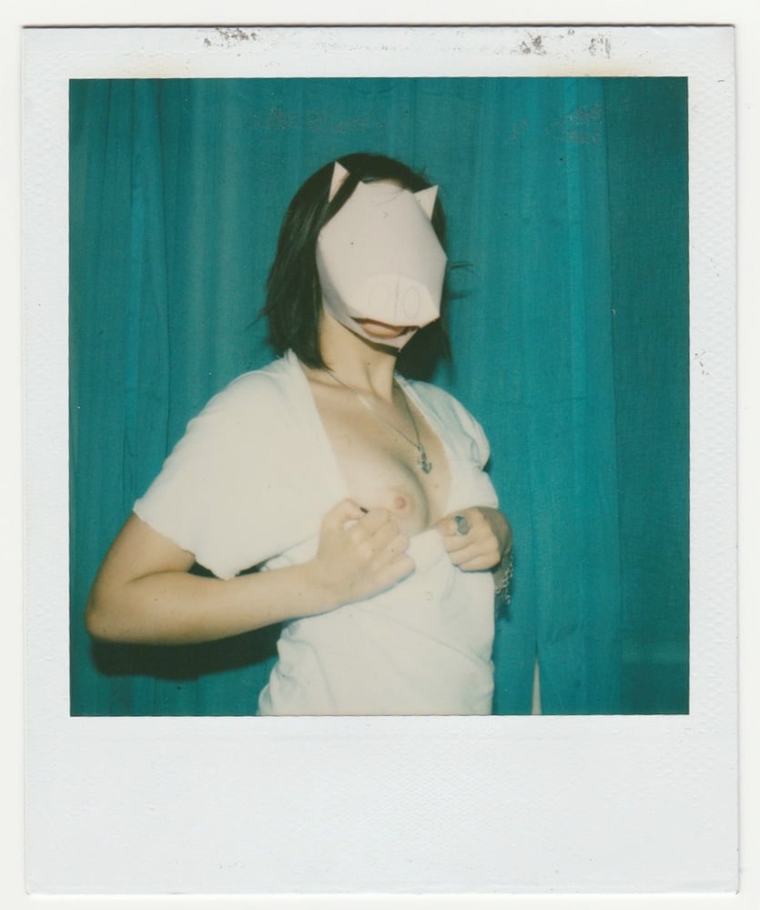 Image of Pasquali: polaroid of a woman wearing a mask