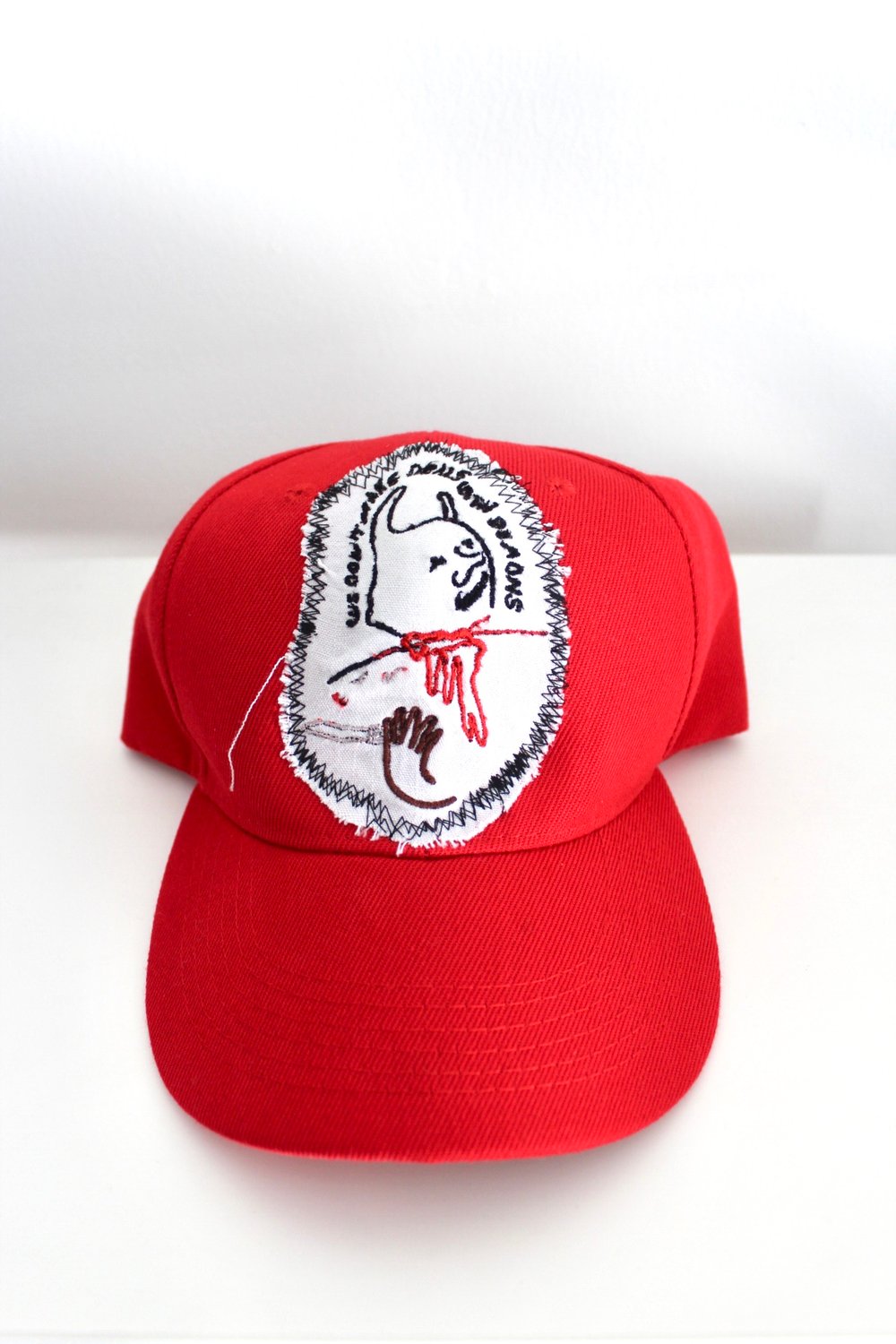 we don’t make deals with demons baseball cap in red