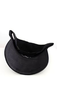 Image of picked out baseball cap in black
