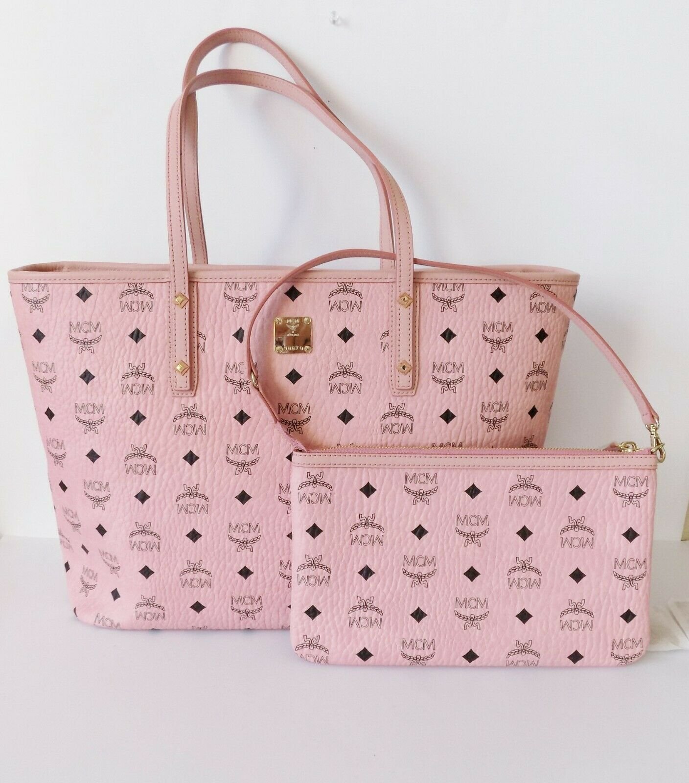 Pink mcm luggage sale