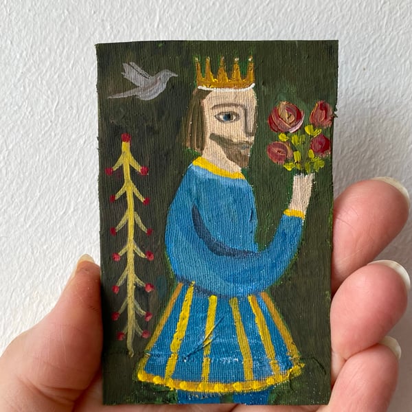 Image of blue king with roses