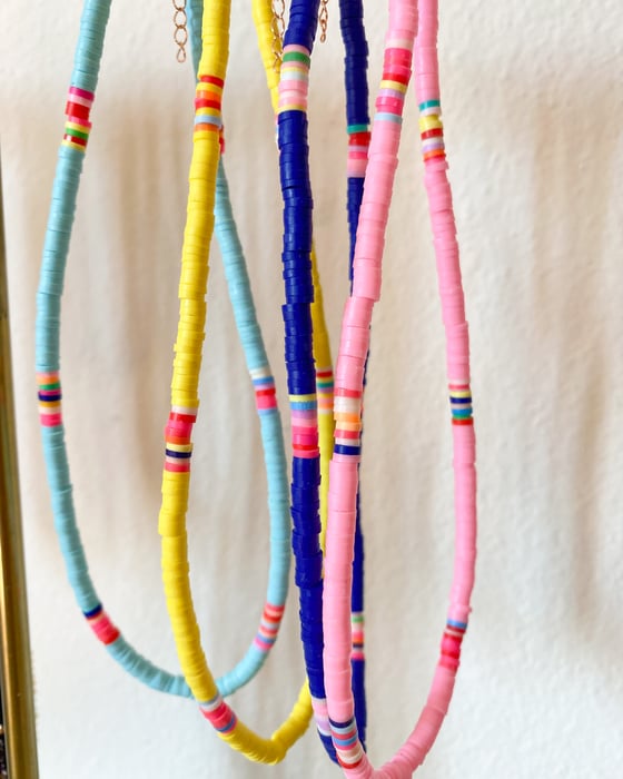 Image of COLLANA DISCHETTI RESINA