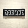 “Doomed” glass painted sign.  (Black and Grey)