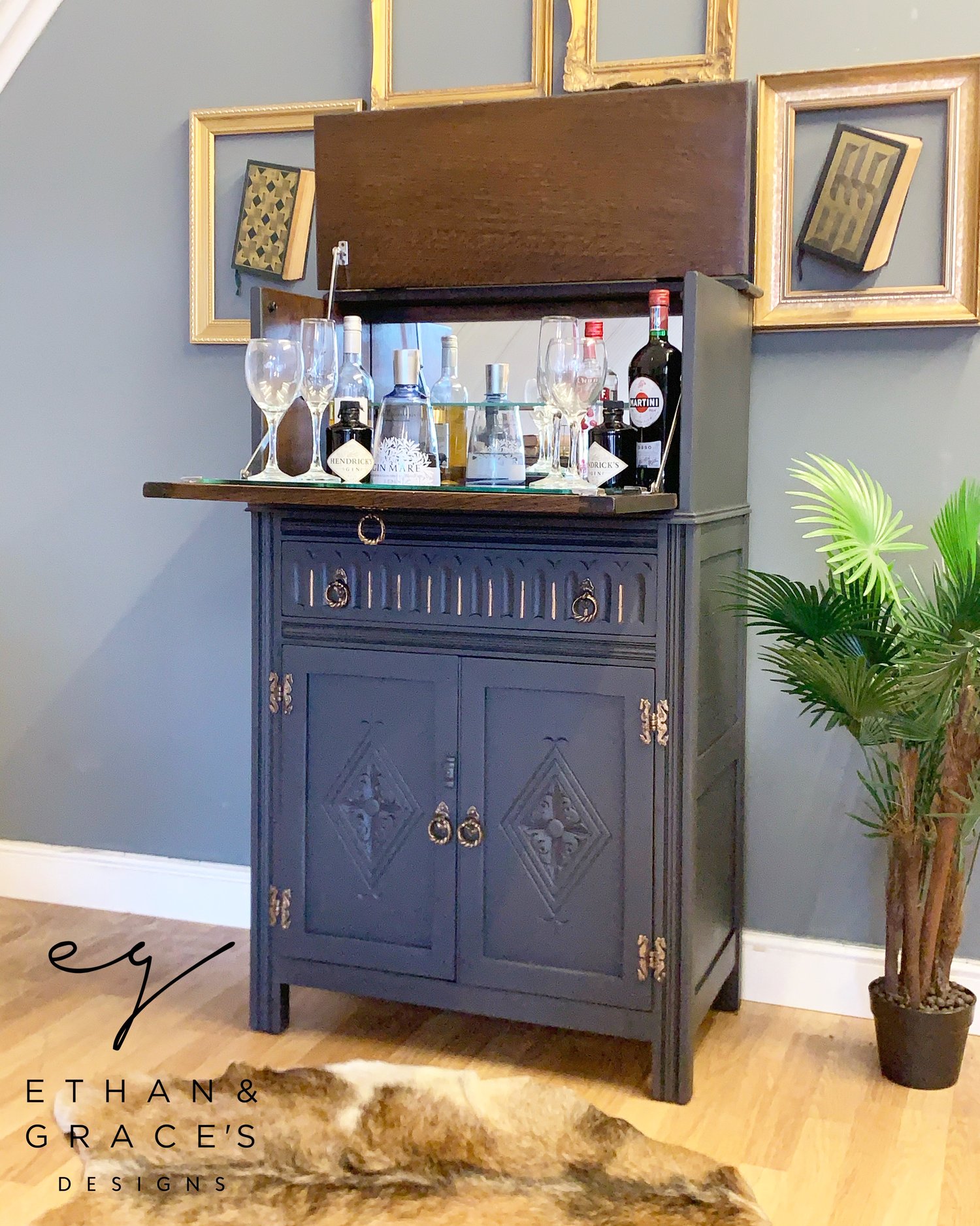 Image of Solid oak drinks cabinet in dark grey & gold.