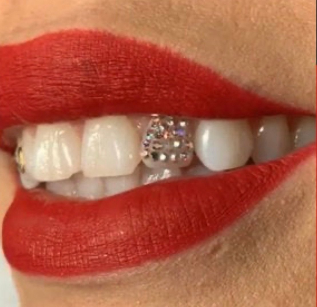 Teeth Gems Training Manual  Sculpted by Bella Beauty Bar LLC