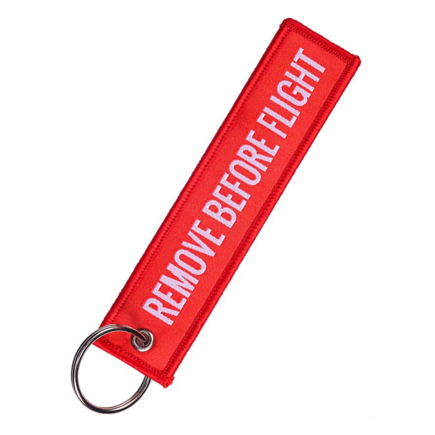 Remove before. Брелок для ключей remove before Flight. Брелок бирка красная. Брелок для ключей | красный. Брелок тканевый красный.