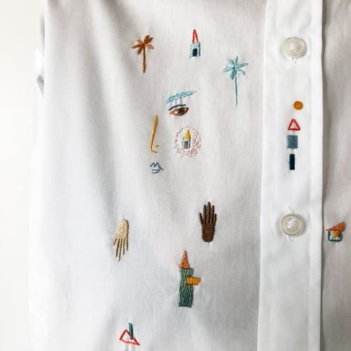 Image of In a search for the feeling of home - hand embroidered 100% cotton shirt, size Small, unisex design
