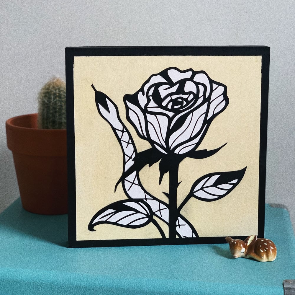 Image of Snake on A Rose Wood Canvas