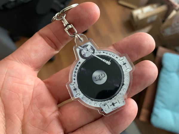 Image of QFO silver keychain
