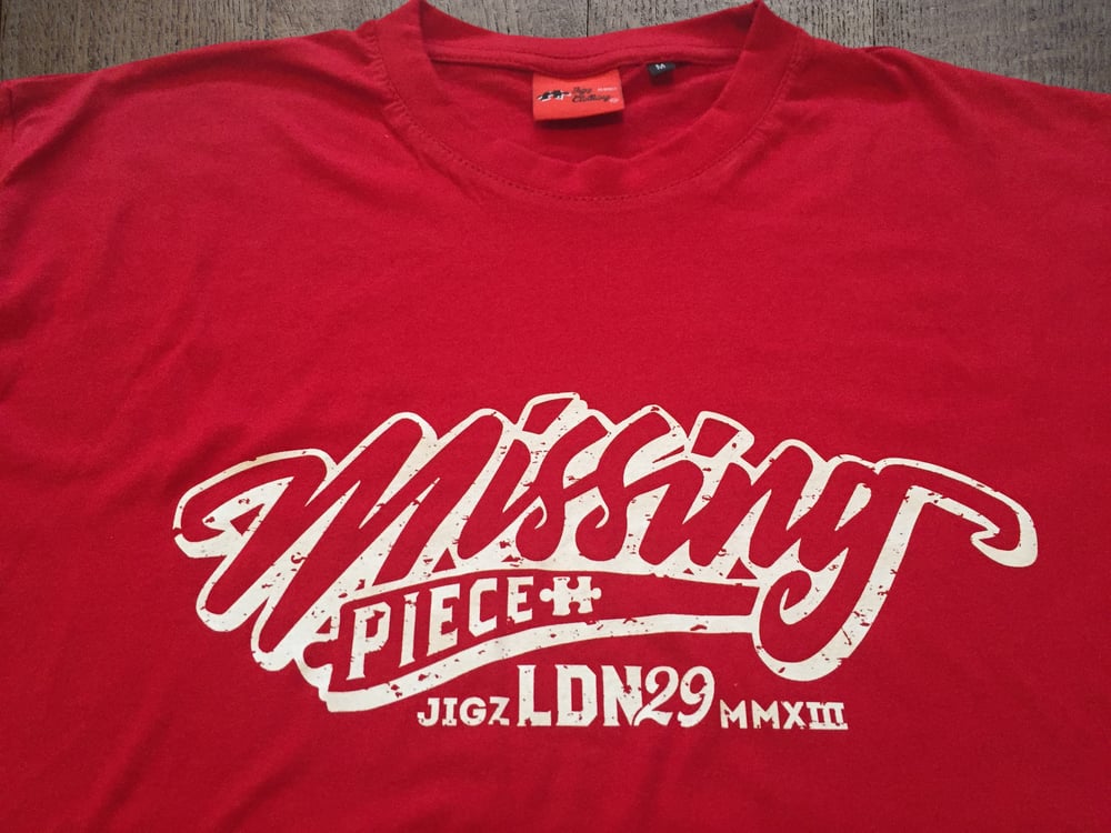 Missing Piece Tshirt In Red Or Black